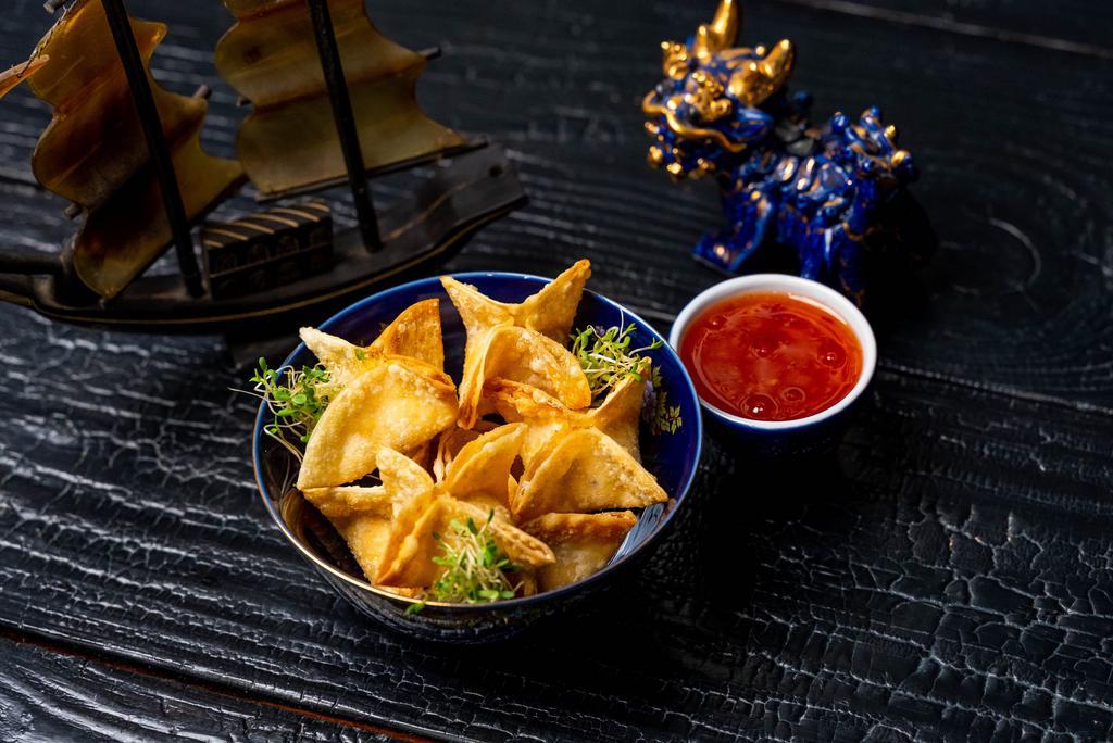 Crab Bomb Wonton · Fried wontons stuffed with Spicy cream cheese crab mixture