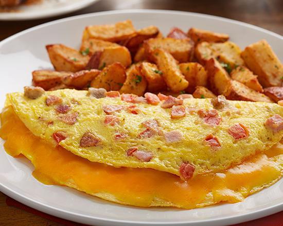 Omelet ham & cheese roasted potatoes · Ham & Cheese Omelet served with roasted potatoes