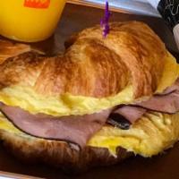Croissant Omelet Ham & cheese w/ Potatoes · Croissant Swiss & ham, tomatoes, lettuce, butter