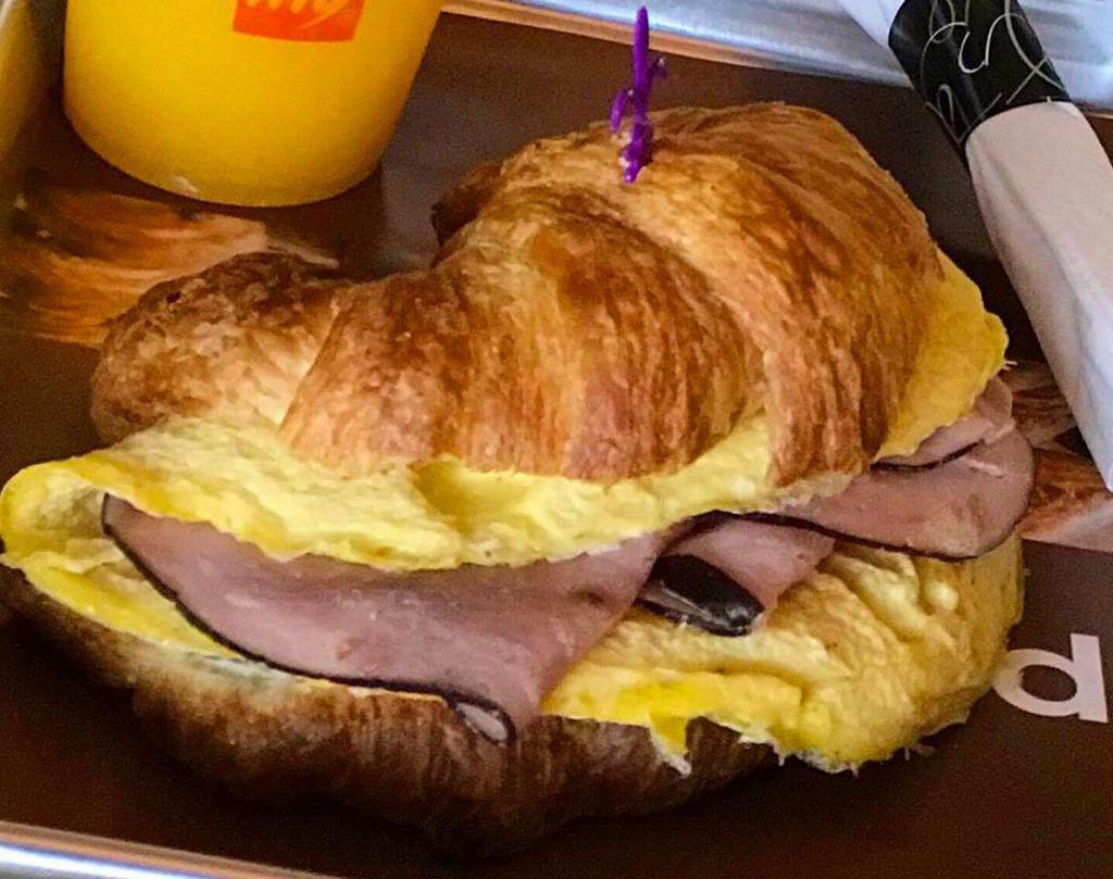 Croissant Omelet Ham & cheese w/ Potatoes · Croissant Swiss & ham, tomatoes, lettuce, butter