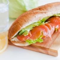 Smoked Salmon Sandwich with chips · Salmon, onion, capers, cream cheese, tomatoes