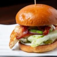 Santa Fe Burger · Grilled chicken breast, fresh avocado, crisp bacon, Swiss cheese, lettuce, tomato, red onion...