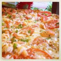 Crab Pizza · Crab meat, tomatoes, spring onions and seasoned Alfredo sauce.