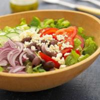 Greek salad · Lettuce, tomato's ,green papers, Red onions ,cucumbers, Black olives & Pepperoncini with fet...