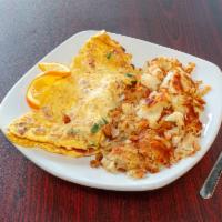 Denver Omelette · Ham, onion, green peppers and cheddar cheese.