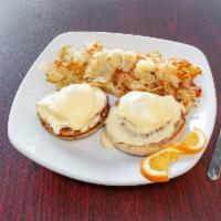 Classic Benedict · Poached fresh eggs, Canadian bacon, toasted English muffin, and an authentic hollandaise sau...