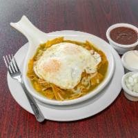 Chilaquiles · Now serving homemade tortilla chips covered in a delicious green or red salsa topped with mo...