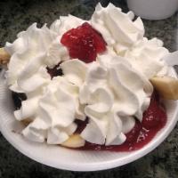 Sundaes · Topped with chocolate sauce, whip cream and a cherry.
