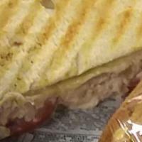 Tuna Melt · Tuna salad, on choice of bread with American cheese, tomato and seasoning grilled to perfect...