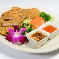 Crispy Chicken · Sliced chicken breast, deep fried with our sweet and sour sauce, and spicy sauce on the side...