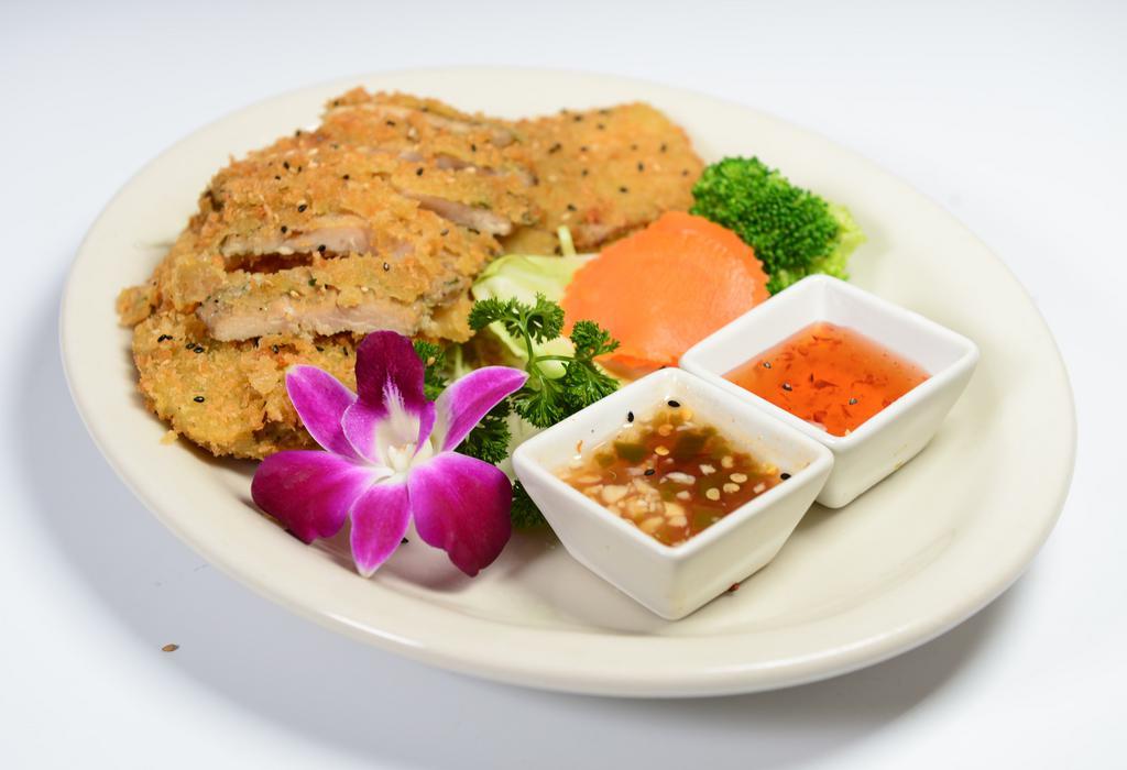 Crispy Chicken · Sliced chicken breast, deep fried with our sweet and sour sauce, and spicy sauce on the side. Served with rice and salad.