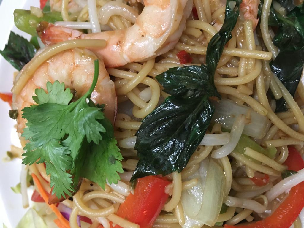 Spaghetti Pad Keemow Prawn · A spicy noodle dish sauteed with green chili,onion, sweet basil, green and red bell peppers.