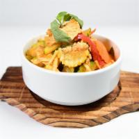 Red Curry · Red curry, coconut milk, bamboo shoot, green and red bell pepper, and mixed vegetables.