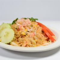  Crab Fried Rice · Crab meat fried rice with egg, onions, topped with cilantro, and cucumber.