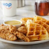 Chicken & Waffles · Four buttermilk crispy chicken breast strips & our Belgian waffle. Served with choice of but...