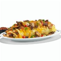 Big Steak Omelette · Steak, hash browns, green peppers, onions, mushrooms, tomatoes & Cheddar. Served with salsa....