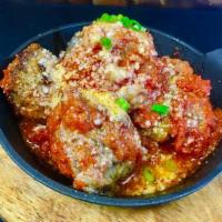 Meatballs · Our house-made meatballs in tomato sauce.