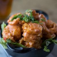 Thai Shrimp · Lightly breaded and fried, tossed in spicy Thai chili sauce.