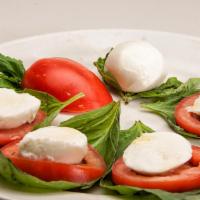 Caprese Salad · Basil, plum tomatoes, fresh mozzarella cheese, olive oil, balsamic vinegar and salt and pepp...