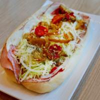 The Spicy Italian Sub · Spiced capicola ham, prosciuttini ham, provolone, Genoa salami, and hot peppers. Topped with...