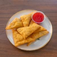 5. Fried Crab Rangoon · 6 pieces. Crispy with cream cheese and crab meat with sweet and sour sauce.