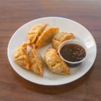 Chicken Dumpling · 6 pieces. Dumplings made of chicken breast, you can choose to steam or fried.