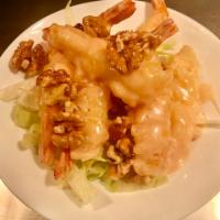 4.Walmut shrimp · Shrimp tempura coated in even spicy coconut milk sauce and topped with crispy walnuts.