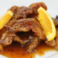 11. Orange Beef · Beef deep-fried then sauteed in rich seasonal hot and spicy orange sauce.