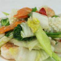 14. Seafood Delight · Lobster meat, shrimp, scallop, crab meat and mixed vegetables in special white sauce.
