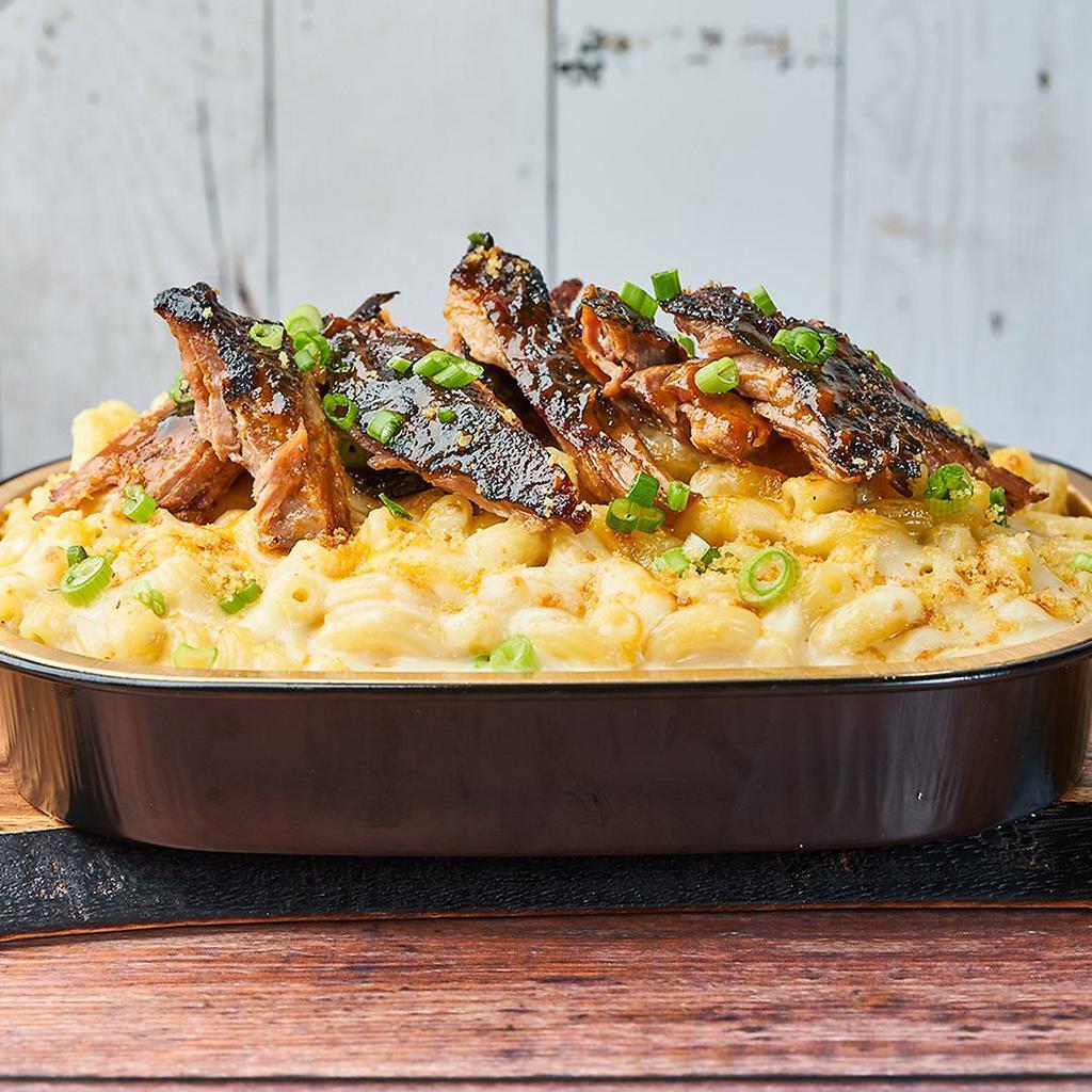BBQ Pulled Pork Mac by Mac 'n Cue · By Mac 'n Cue by International Smoke. Smoked slowly in our wood smoker and tossed with smokey mama BBQ sauce. We cannot make substitutions.
