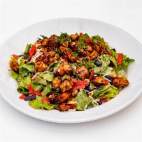 BBQ Chicken Salad · Chopped romaine, seasoned chicken, roasted corn, black beans, avocado, tortilla strips, red ...