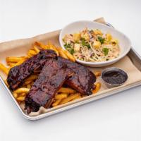 Borracho Spare Ribs · Smoked St. Louis spare ribs, tequila BBQ sauce, fries, coleslaw.