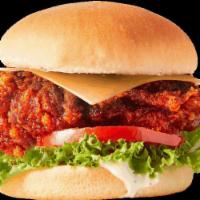 Spicy Chicken Sandwich · Not-your-average chicken wrapped between two fluffy buns. Enjoy the Deluxe with cheese, lett...
