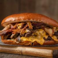 The Hustler Burger · Pretzel bun, double 4 oz. black Angus meat, American cheese, grilled onions, grilled mushroo...