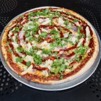 BBQ Chicken Pizza · Chicken breast, red onions and cilantro with our own BBQ sauce.