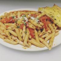 Penne Arribbiatta · Chicken, Roma tomatoes, garlic, basil, spicy marinara sauce and penne pasta.