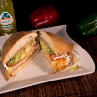Mexican Sandwich · Torta. Come with beans, lettuce, tomato, onion, avocado, and sour cream. Jalapeno upon reque...