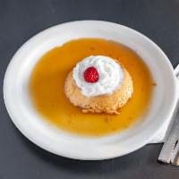 Flan Napolitano · Caramel glazed custard, vanilla extract, and sugar, topped with whipped cream and cherry.