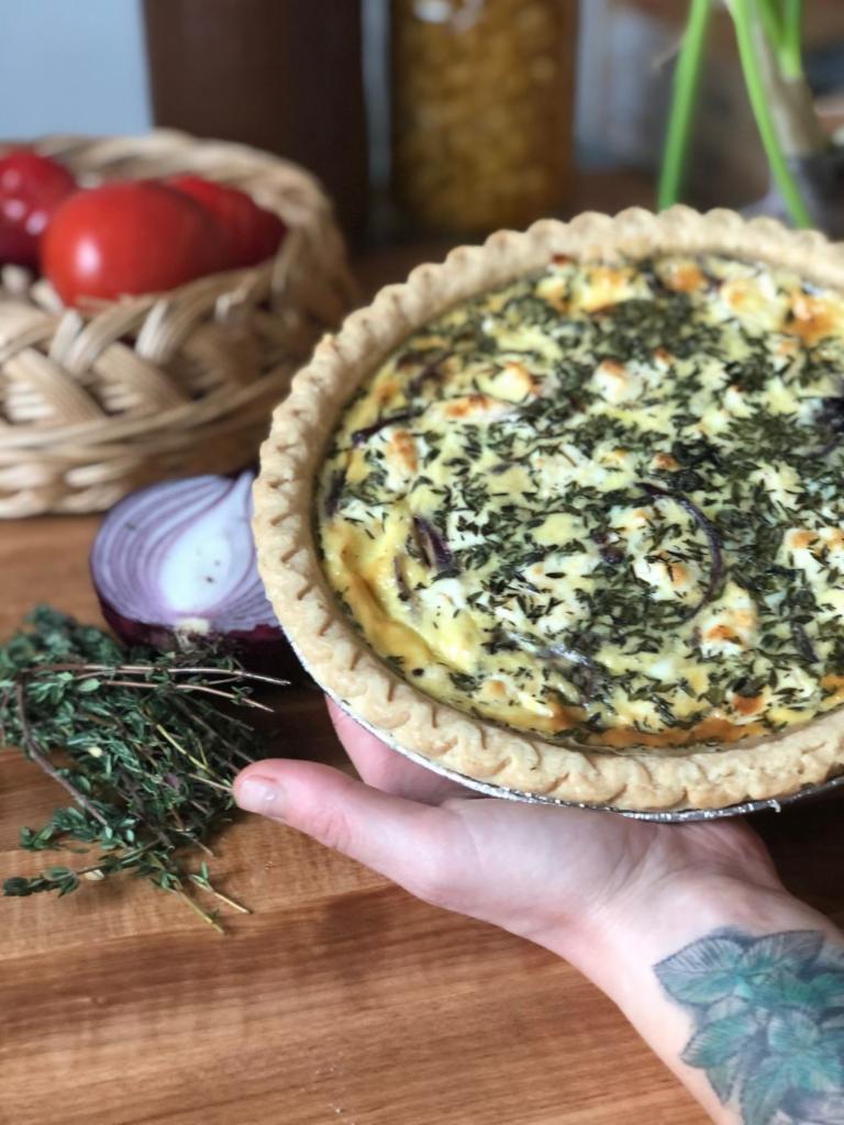 Quiche and a Green Side Salad · Freshly made quiche of the moment served with a green side salad. 

