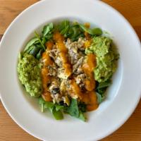 Breakfast Bowl · Eggs scrambled with black beans and cheese, served with two scoops of our avocado mash on a ...
