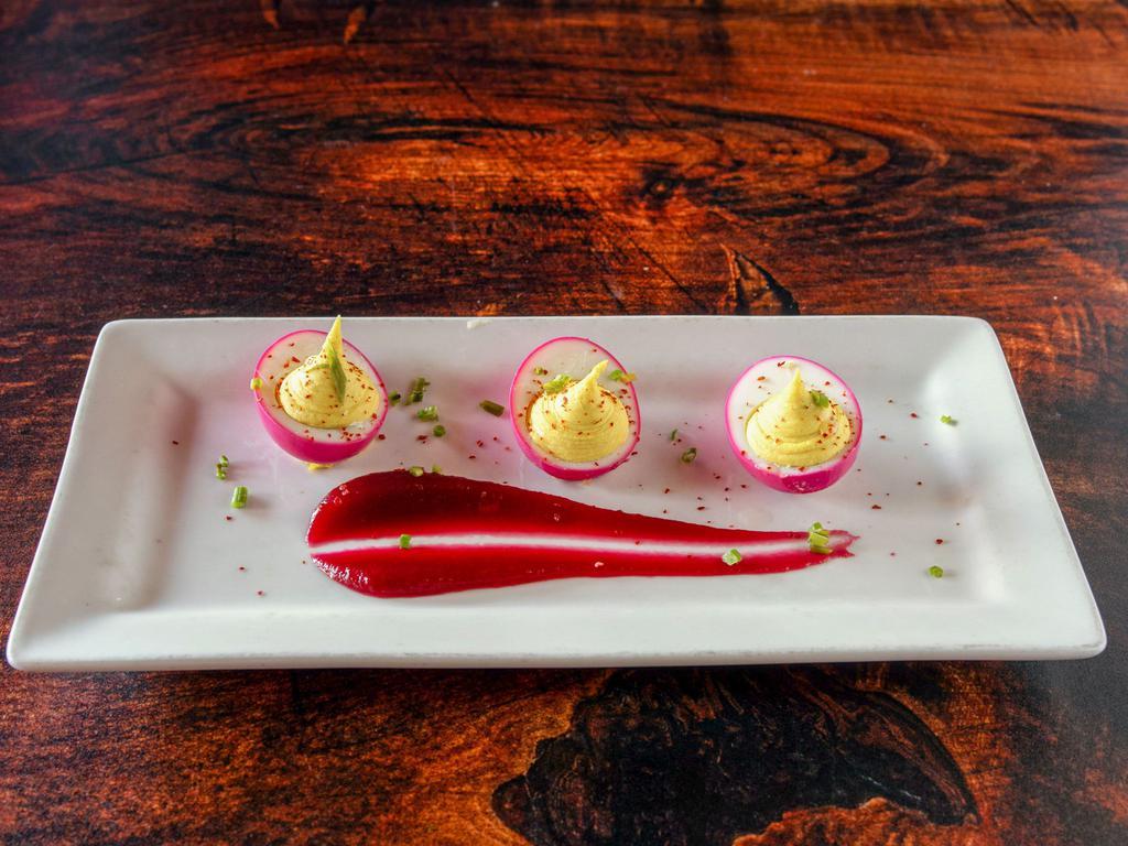 Hickman Deviled Eggs · Truffle olive oil, Korean chili flakes and chives.