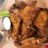 Wings · Wings are smoked three hours and fried to order. 8 jumbo wings served with celery and your c...