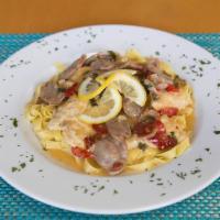 Scarpariello · Medallions stewed in a lemon butter chardonnay sauce with sauteed onions and hot cherry pepp...