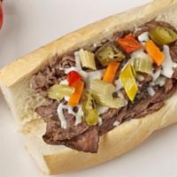 Italian Beef Sandwich · Italian beef dipped in Au Jus and prepared over a 6