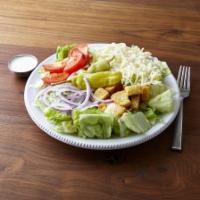 Tossed Salad · Fresh crisp lettuce, topped with tomatoes, red onions, pepperoncini peppers, cheese and crou...