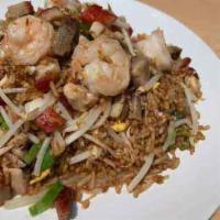 House Fried Rice · Your choice of up to 3 proteins wokked with seasoned rice, green onions, beansprouts