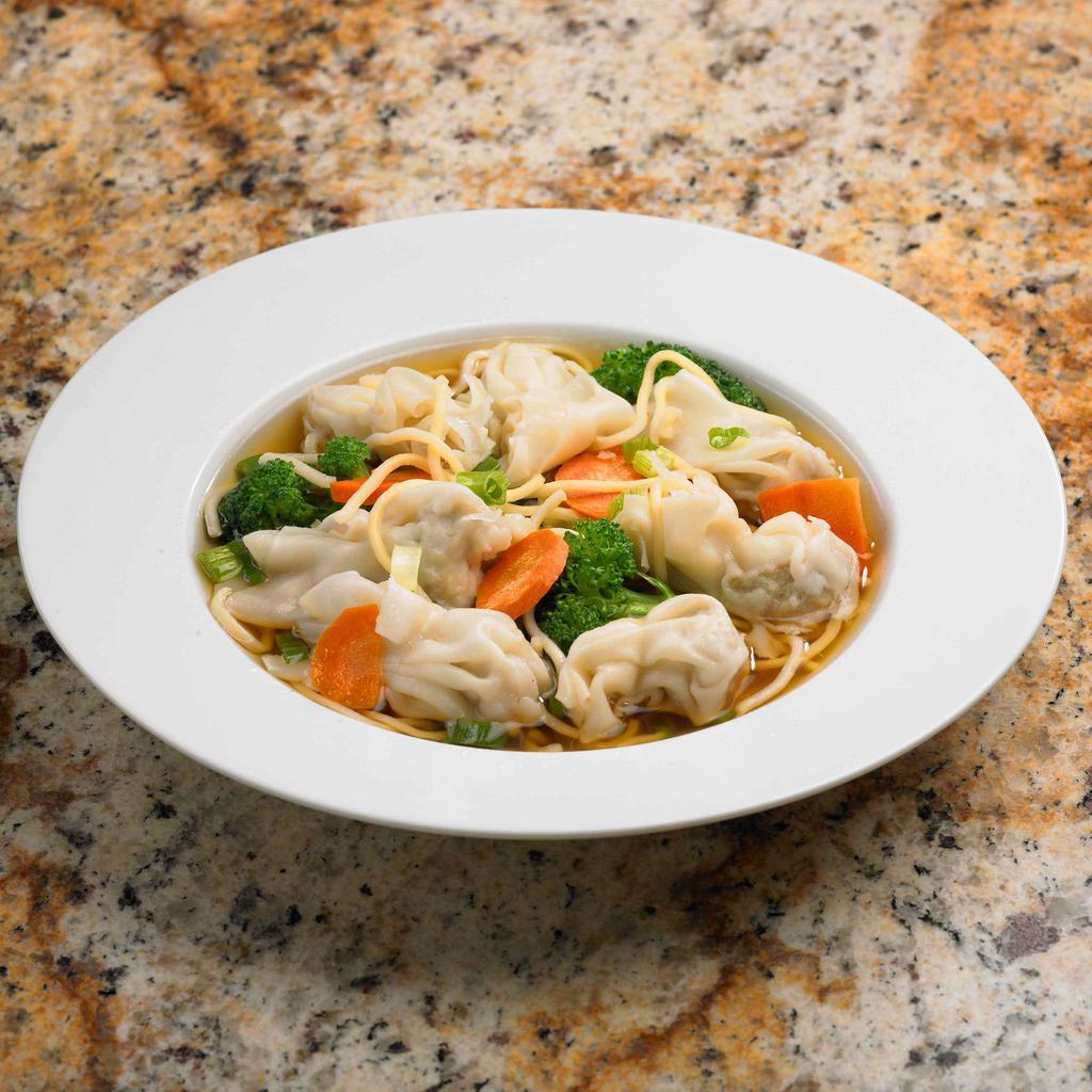 Wonton Noodle Soup · Ground pork and shrimp wontons in a hot broth with broccoli florets and green onions.