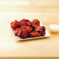 8 BBQ Wings · Bone-in wings are oven baked and covered in a bold BBQ sauce.
