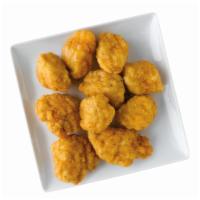 10 Chicken Poppers · All-white chicken breast pieces breaded and oven-baked.