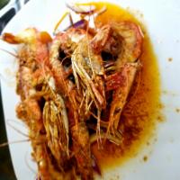 1/2 Charola de Langostinos · Half tray of prawns.